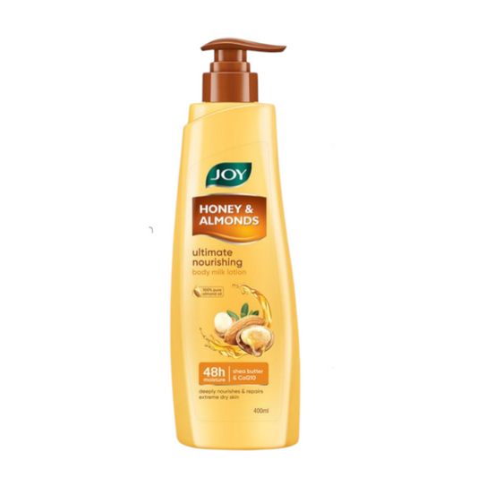JOY Honey & Almonds body lotion bottle on a white background